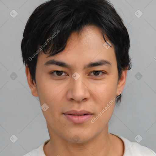 Joyful asian young-adult male with short  black hair and brown eyes