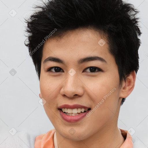 Joyful asian young-adult female with short  brown hair and brown eyes