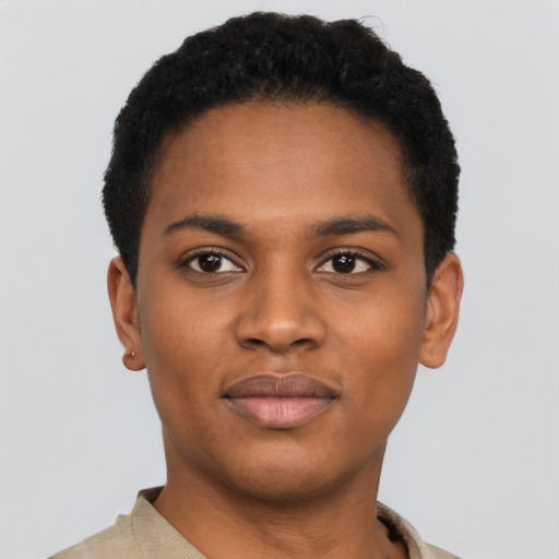 Joyful black young-adult female with short  black hair and brown eyes