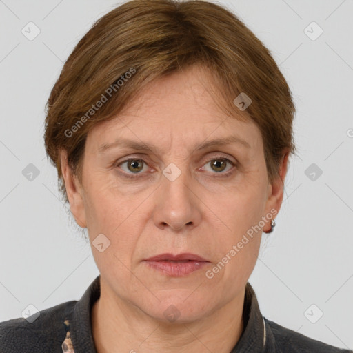 Joyful white adult female with short  brown hair and grey eyes