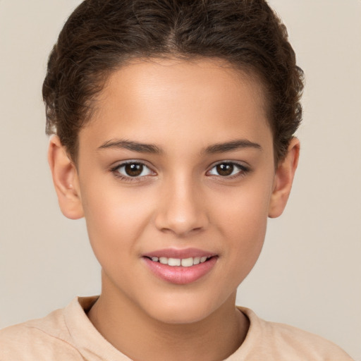 Joyful white child female with short  brown hair and brown eyes