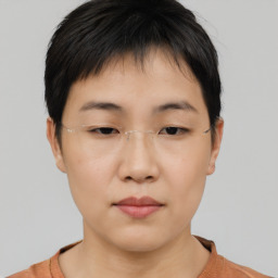 Neutral asian young-adult female with short  brown hair and brown eyes