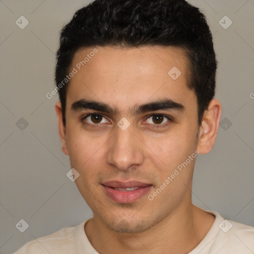 Joyful white young-adult male with short  black hair and brown eyes