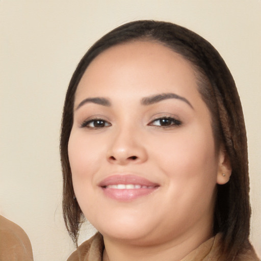 Joyful white young-adult female with long  brown hair and brown eyes