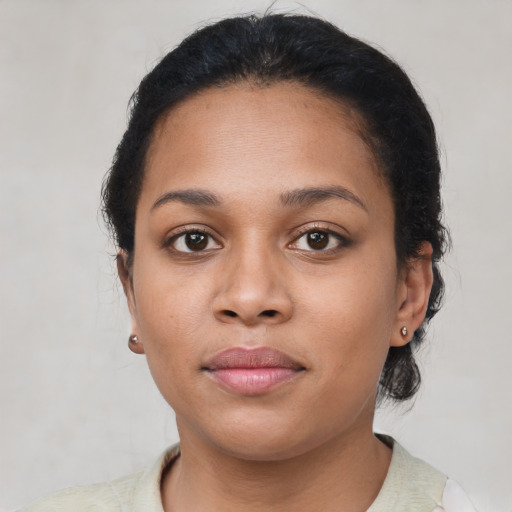Neutral black young-adult female with short  brown hair and brown eyes