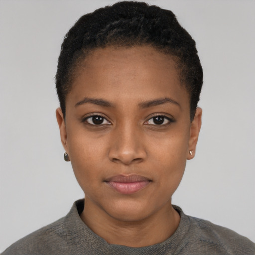 Neutral black young-adult female with short  black hair and brown eyes