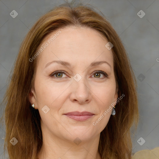 Joyful white adult female with medium  brown hair and brown eyes