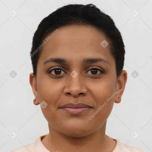 Joyful latino young-adult female with short  brown hair and brown eyes