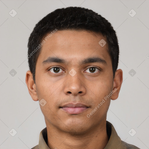 Neutral latino young-adult male with short  black hair and brown eyes