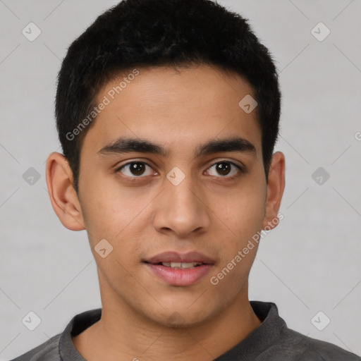 Joyful latino young-adult male with short  brown hair and brown eyes