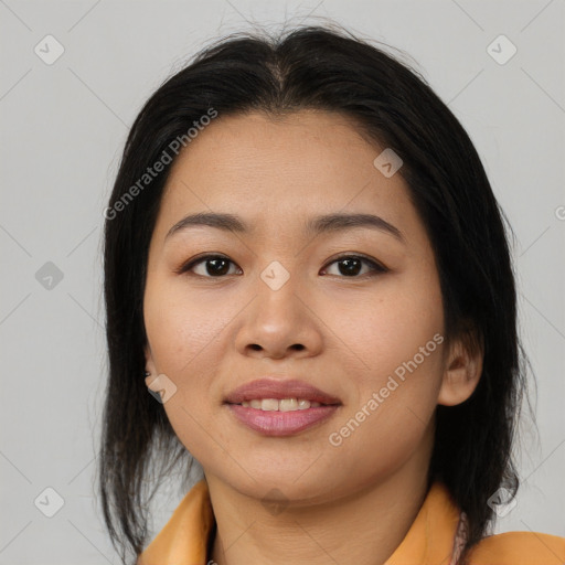 Joyful asian young-adult female with medium  brown hair and brown eyes