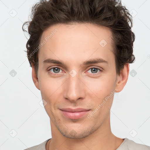 Neutral white young-adult male with short  brown hair and grey eyes