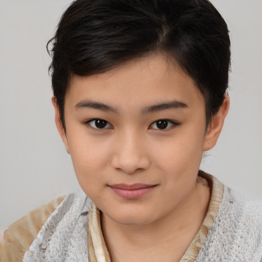 Joyful white child female with medium  brown hair and brown eyes