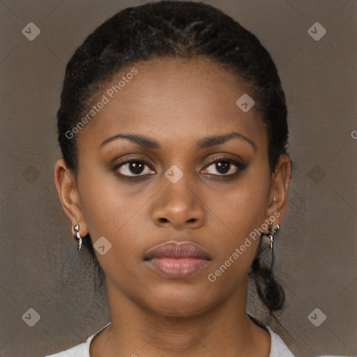 Neutral black young-adult female with long  brown hair and brown eyes