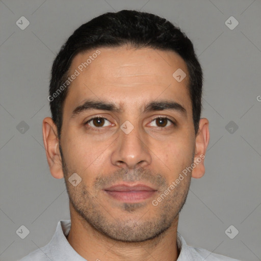 Joyful white adult male with short  brown hair and brown eyes