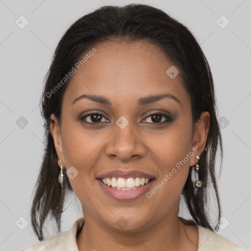 Joyful latino young-adult female with medium  brown hair and brown eyes