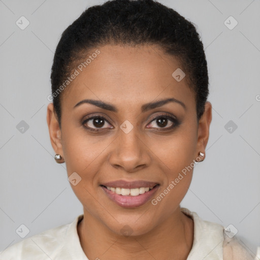 Joyful black young-adult female with short  brown hair and brown eyes