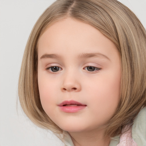 Neutral white child female with medium  brown hair and brown eyes