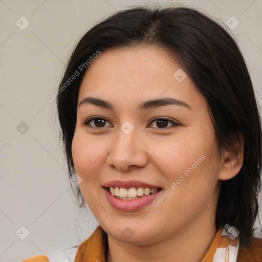 Joyful asian young-adult female with medium  brown hair and brown eyes