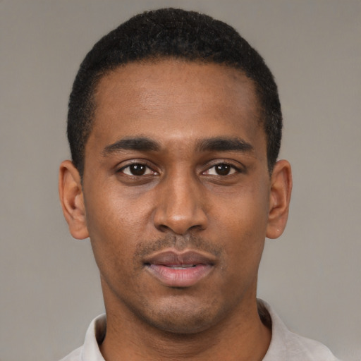 Neutral black young-adult male with short  black hair and brown eyes