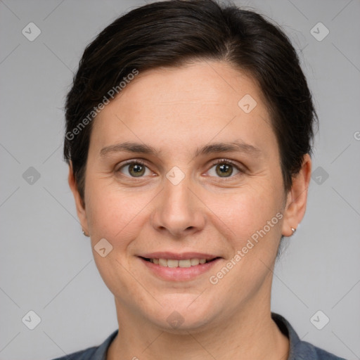 Joyful white adult female with short  brown hair and brown eyes