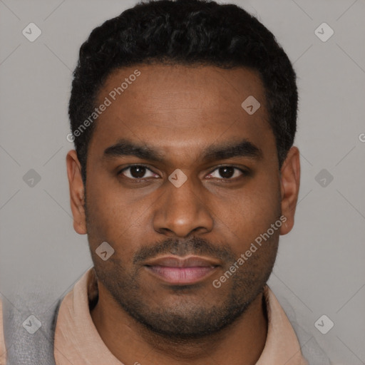 Joyful latino young-adult male with short  brown hair and brown eyes