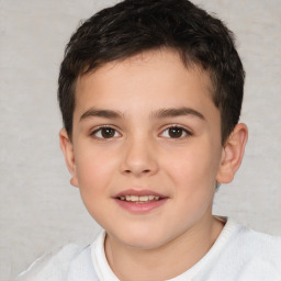 Joyful white child male with short  brown hair and brown eyes