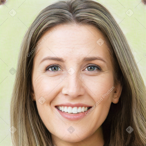 Joyful white young-adult female with long  brown hair and green eyes