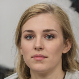 Neutral white young-adult female with medium  brown hair and grey eyes