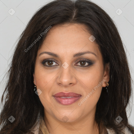 Joyful white adult female with long  brown hair and brown eyes