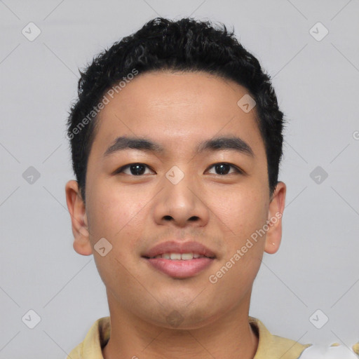 Joyful asian young-adult male with short  black hair and brown eyes