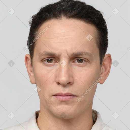 Neutral white adult male with short  brown hair and brown eyes