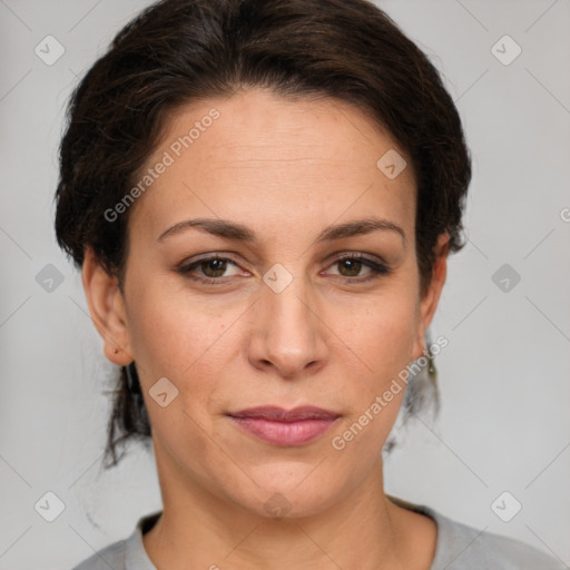 Joyful white adult female with medium  brown hair and grey eyes