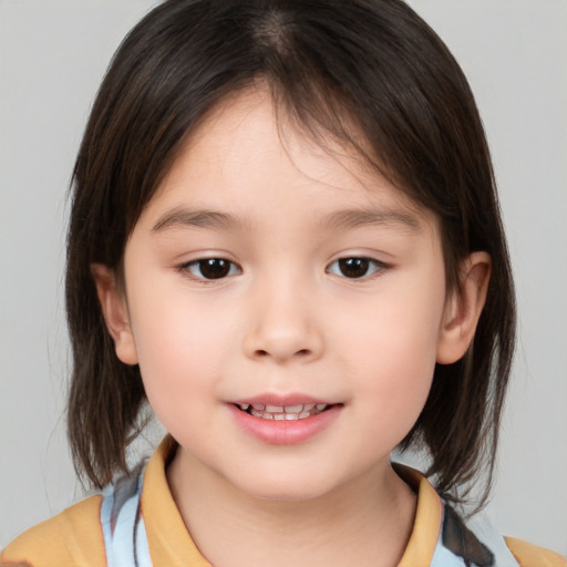 Joyful white child female with medium  brown hair and brown eyes