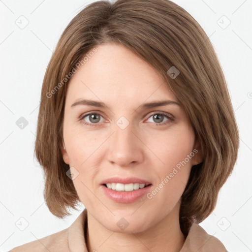 Joyful white young-adult female with medium  brown hair and green eyes