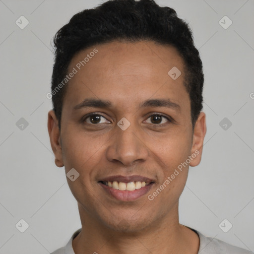 Joyful latino young-adult male with short  black hair and brown eyes