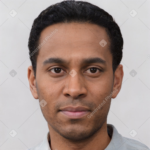 Neutral latino young-adult male with short  black hair and brown eyes