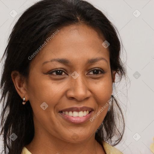 Joyful latino young-adult female with medium  brown hair and brown eyes