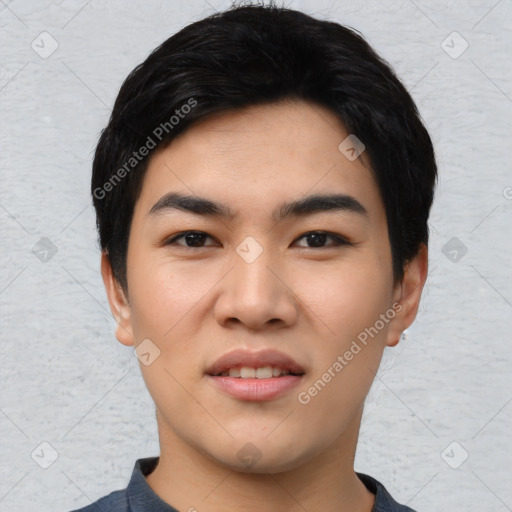 Joyful asian young-adult male with short  black hair and brown eyes