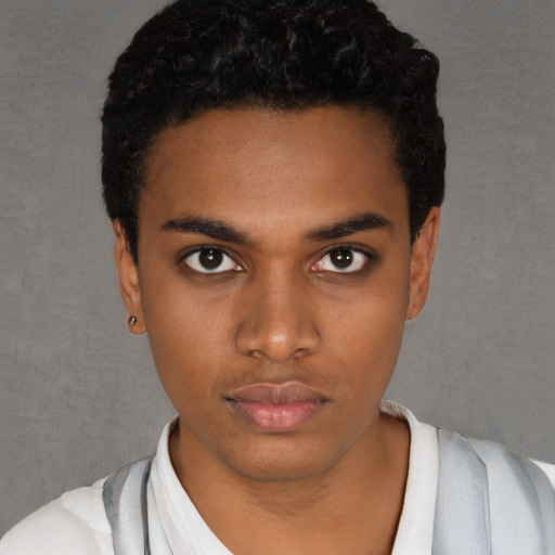 Neutral black young-adult male with short  black hair and brown eyes