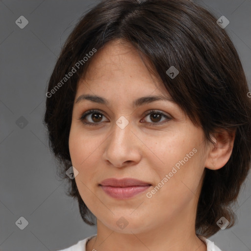 Joyful white adult female with medium  brown hair and brown eyes