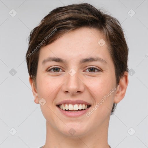 Joyful white young-adult female with short  brown hair and grey eyes