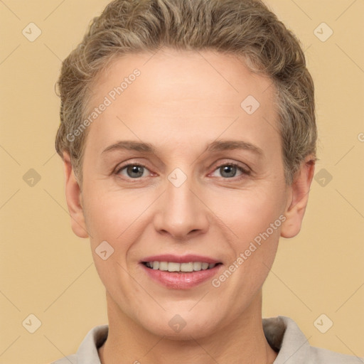 Joyful white adult female with short  brown hair and brown eyes