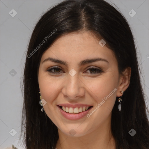 Joyful white young-adult female with long  brown hair and brown eyes