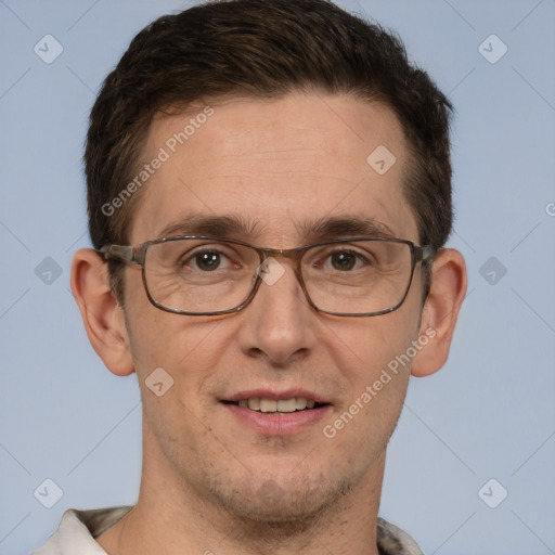 Joyful white adult male with short  brown hair and grey eyes