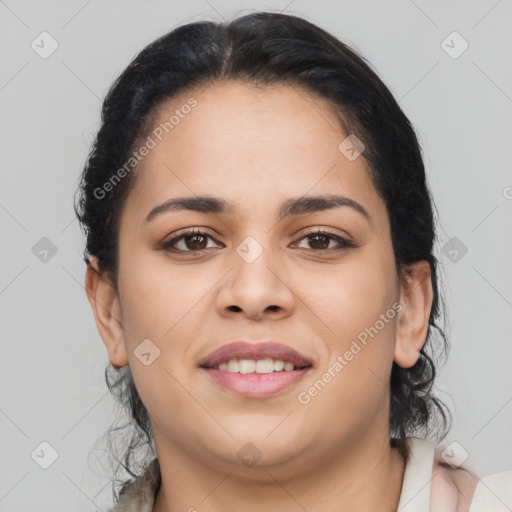 Joyful latino young-adult female with medium  brown hair and brown eyes