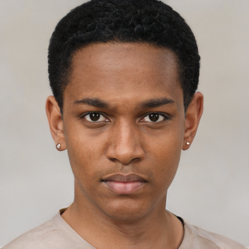 Neutral black young-adult male with short  black hair and brown eyes