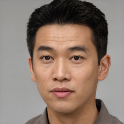 Neutral asian young-adult male with short  black hair and brown eyes