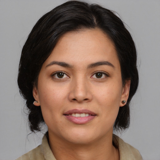 Joyful asian young-adult female with medium  brown hair and brown eyes