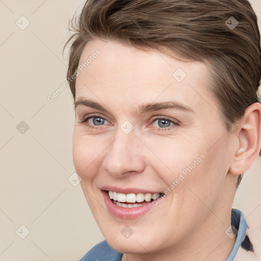 Joyful white young-adult female with medium  brown hair and grey eyes